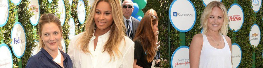 Drew Barrymore y Ciara compiten por ver quién está más embarazada en un evento benéfico