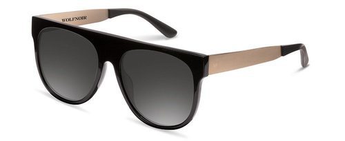 Gafas con montura dorada diseñadas por Chino Darín para Wolfnoir